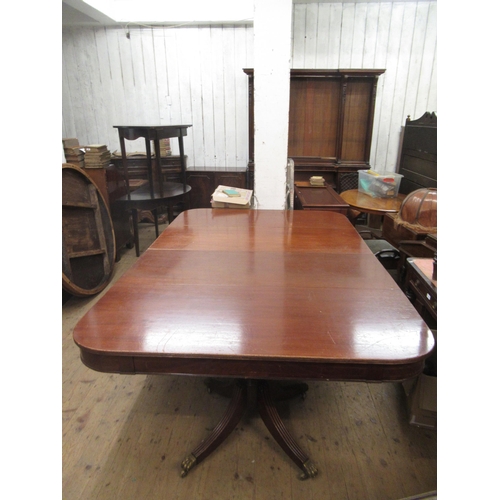 2037 - Large mahogany D-end pedestal dining table with two extra leaves, having turned columns and reeded s... 