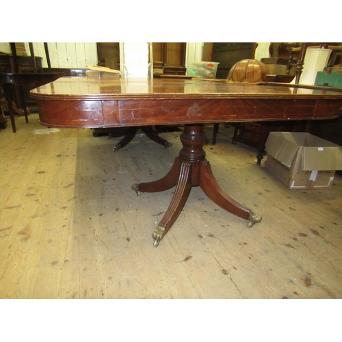 2037 - Large mahogany D-end pedestal dining table with two extra leaves, having turned columns and reeded s... 