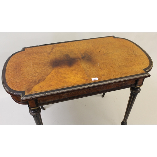 2038 - 19th Century birdseye maple crossbanded and inlaid centre table having gilt metal mounts, raised on ... 