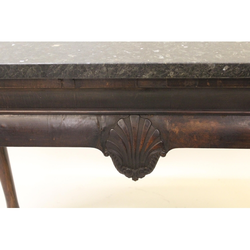 2039B - 19th Century Irish mahogany console table, the later composite marble top above centre carved shell,... 