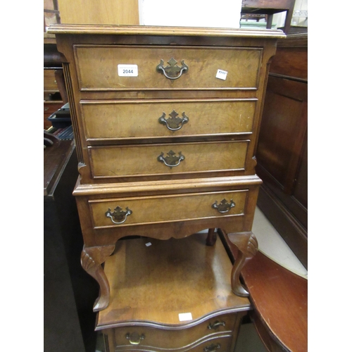 2044 - Reproduction figured walnut serpentine fronted four drawer bedside chest, together with another simi... 