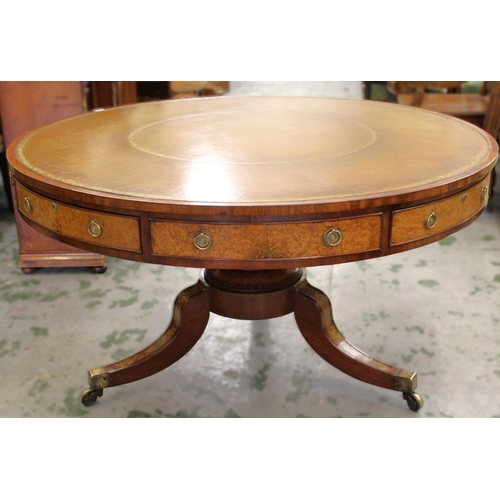 2046 - 19th Century mahogany and burr walnut circular drum table with leather inset top having gilt tooled ... 