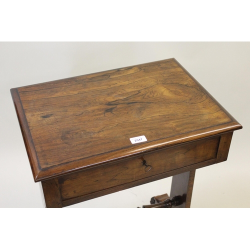 2047 - 19th Century rosewood work table, the rectangular moulded top above a single frieze drawer, with fit... 