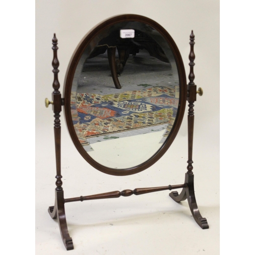 2067 - Mahogany line inlaid mirror with turned support and bevelled plate mirror, 64.5cm high