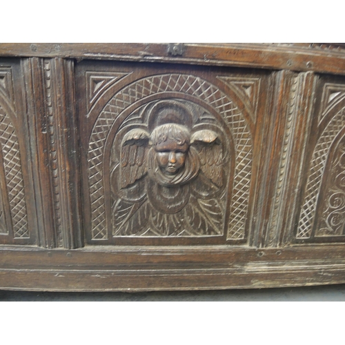 2071 - Antique oak coffer with panelled front, 116cm wide x 50cm deep x 69cm high