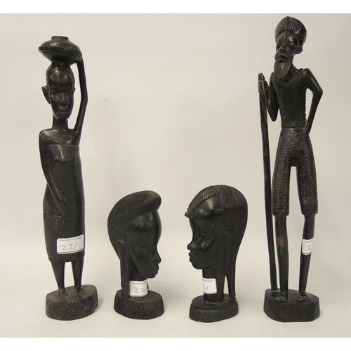 221 - Pair of African carved ebony figures, together with four other similar smaller figures, 82cm high la... 