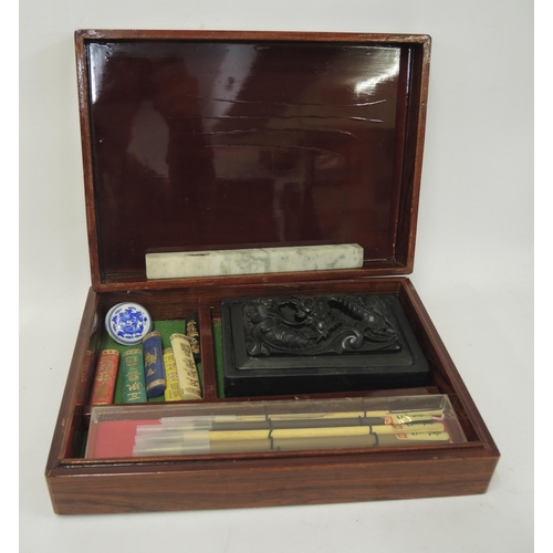 230 - Cased Oriental writing set, another smaller photo tinting outfit, quantity of paper for book marblin... 