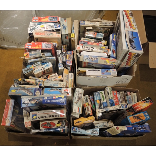 239 - Four boxes containing a large quantity of aircraft kits including Airfix, revel etc