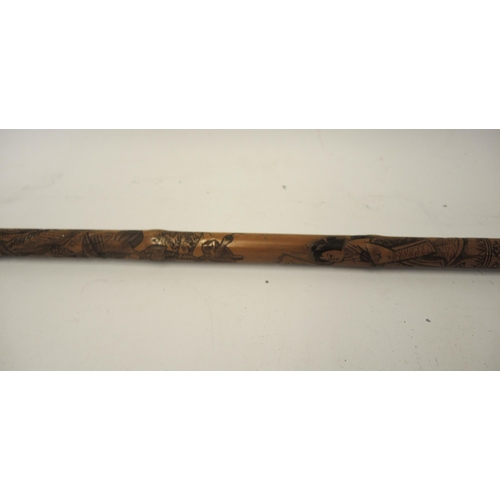 258 - Late 19th / early 20th Century Japanese bamboo walking stick with carved decoration