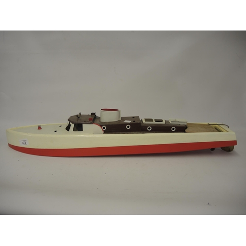 272 - Painted wooden model motorboat with live steam motor, 76cm long