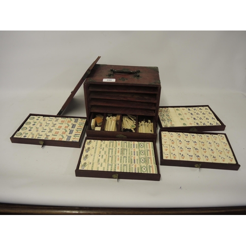 288 - Composite and bamboo Mahjong set, housed on a wooden case