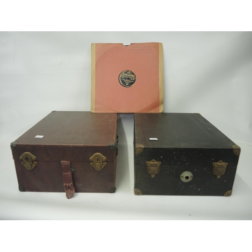 309 - Selecta table model wind-up gramophone in a red case, together with a similar gramophone in a black ... 