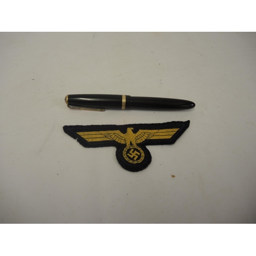 310 - Parker Duofold fountain pen, together with a Third Reich uniform badge