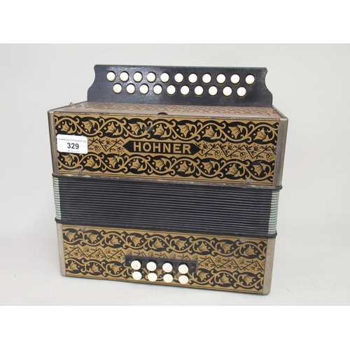 329 - Hohner child's accordion