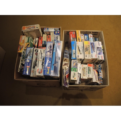 338 - Two boxes containing a collection of various model aircraft kits, unbuilt