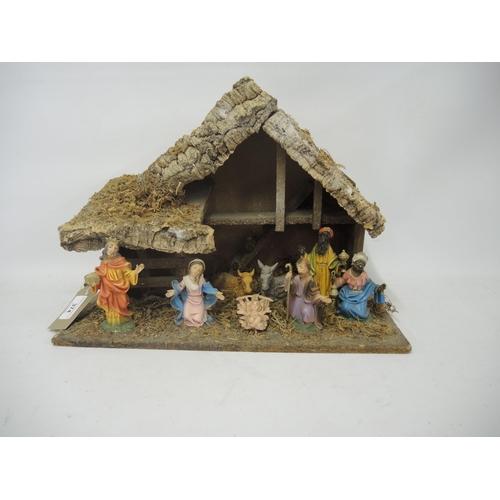 374 - Mid 20th Century wooden and composition nativity model, 38.5cm wide