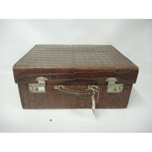 382 - Late 19th / early 20th Century brown leather dressing case (lacking interior fittings)