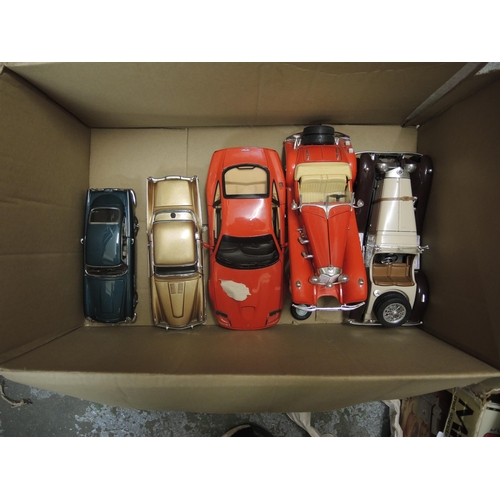 398 - Group of five various large scale model vehicles by Burago and others (unboxed)