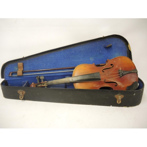 415 - 20th Century violin with bow in a fitted case