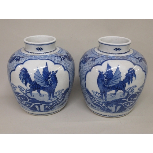 488 - Pair of unusual Chinese porcelain oviform vases decorated with panels of deer in landscapes on a key... 