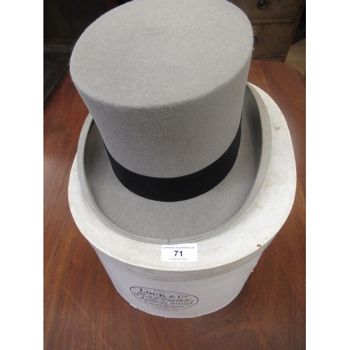 71 - Grey top hat by Moss Bros, size 7.25