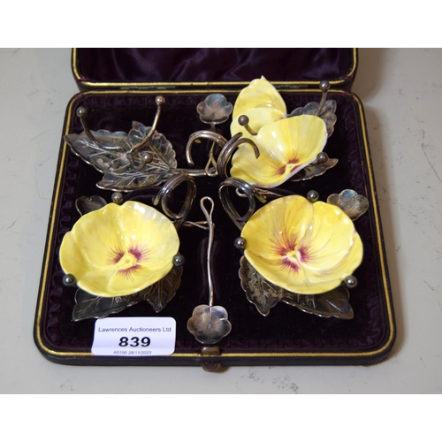 839 - Silver plate and porcelain four piece condiment set in fitted box (with damages and losses)