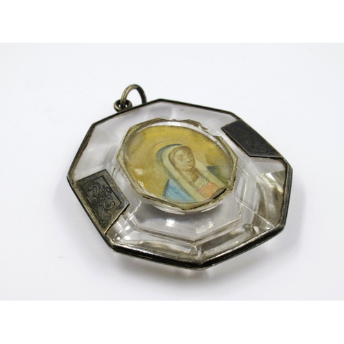 868 - Antique crystal and white metal mounted pendant  (damages) inset with a portrait of the Madonna oppo... 