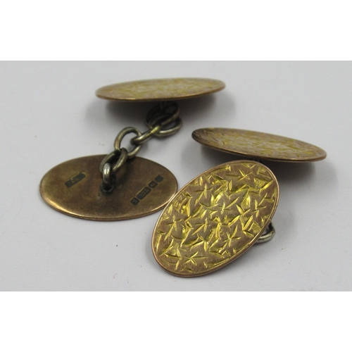 876 - Pair of oval 9ct gold cufflinks, 5.5g