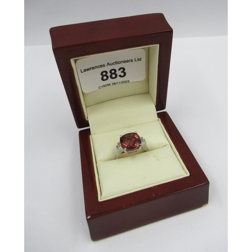 883 - Platinum ring set central tourmaline with baguette diamond set shoulders, size K, in wooden ring box