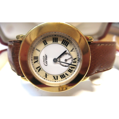 887 - Must de Cartier, ladies silver gilt wristwatch, the circular 33mm case with Roman numerals and subsi... 