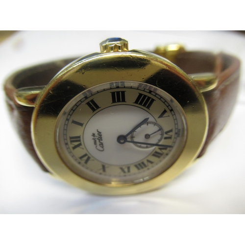 887 - Must de Cartier, ladies silver gilt wristwatch, the circular 33mm case with Roman numerals and subsi... 