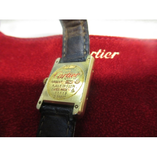 889 - Must de Cartier ladies silver gilt tank silver wristwatch, the white dial with Roman numerals, on a ... 