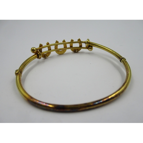 902 - Edwardian gold triple horseshoe bangle set seed pearls (at fault), 7g