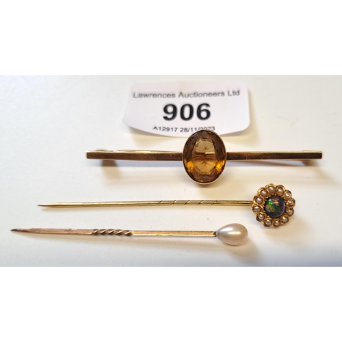 906 - Victorian black opal and seed pearl set stick pin, cultured pearl stick pin and a gold smoky quartz ... 