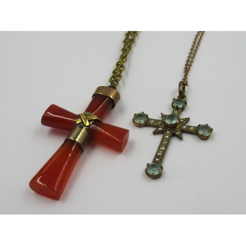 911 - 9ct Gold and blue zircon cross and chain and a rolled gold and cornelian cross and chain