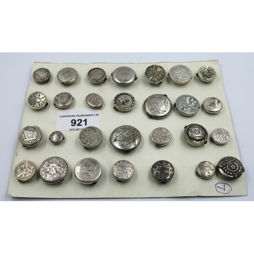 921 - Card containing a collection of twenty eight silver bachelor buttons of varying designs