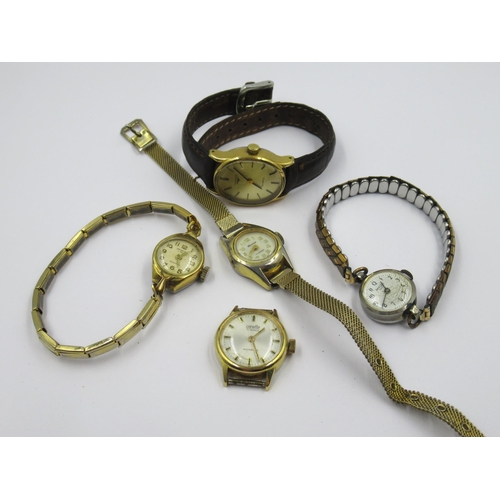 933 - Ladies Longines gold plated wristwatch on leather strap, together with three other ladies wristwatch... 