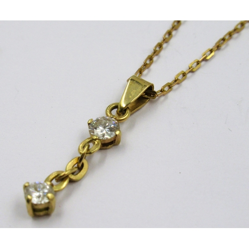 969 - Modern 14ct gold and two stone diamond drop pendant on a 9ct gold chain