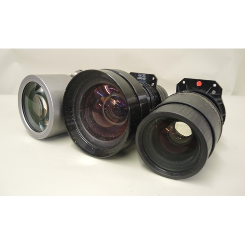 97 - Two large Epson camera lenses together with another similar