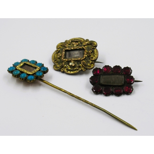 981 - Antique gilt metal mourning brooch, similar turquoise set stick pin and another mourning brooch