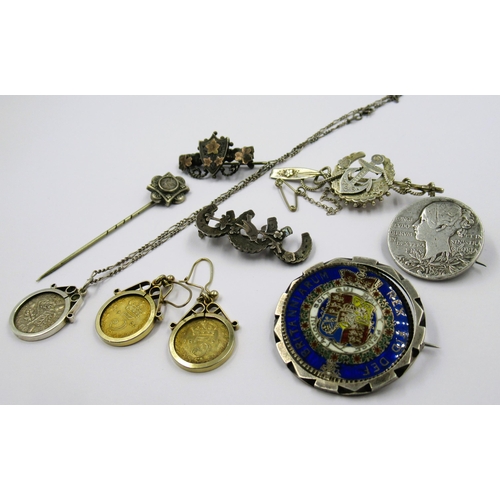 982 - Small bag containing a quantity of various silver jewellery, brooches, pendants, coin inset earrings... 