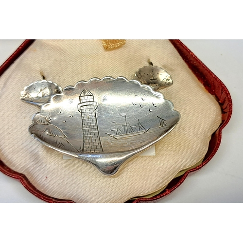 985 - Silver brooch and earring set engraved with a lighthouse, snake ring, silver earrings etc.