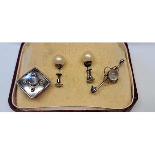 985 - Silver brooch and earring set engraved with a lighthouse, snake ring, silver earrings etc.