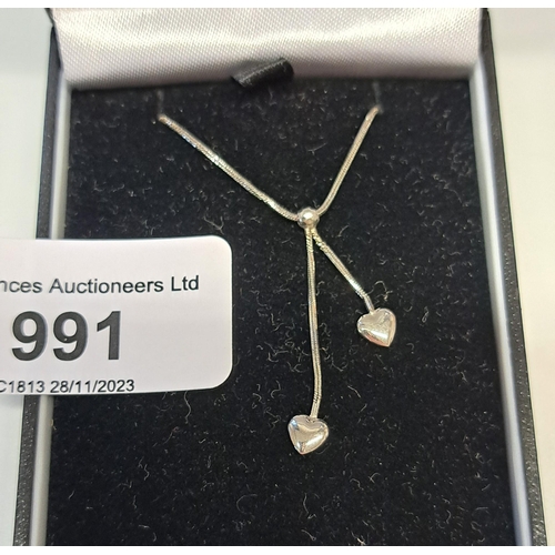 991 - 9ct White gold necklace in box. (Chain at fault)