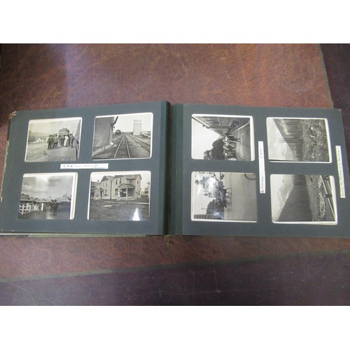 303 - Four photograph albums containing a quantity of 19th Century and later photographs of Canada, Fiji, ... 