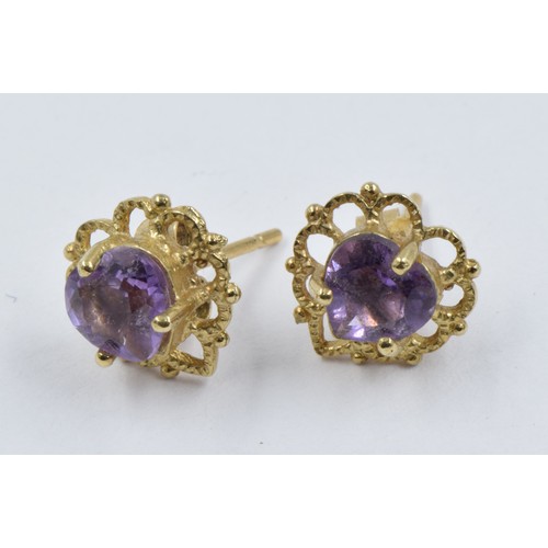 1046 - Pair of silver gilt circular stud earrings set with old flat cut diamonds and a halo of rubies, toge... 