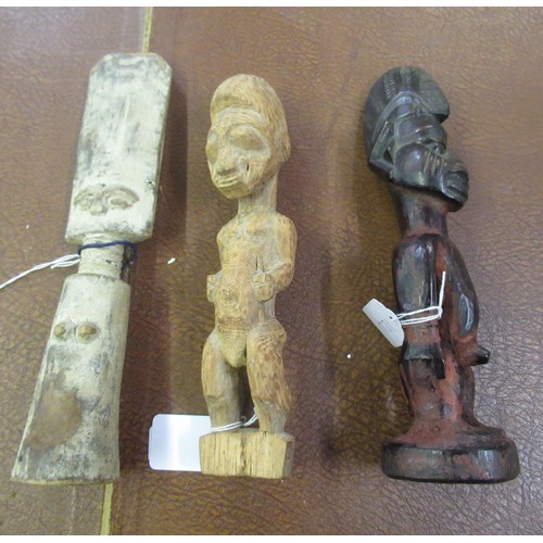 124 - Three African tribal carved wooden fertility figures (Ibeji, Baule, Fante), the tallest 28cm