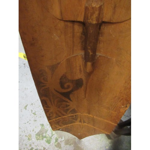 225 - African wooden tribal shield, painted with a mask head, 131cm high