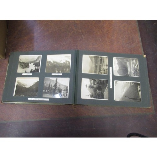 303 - Four photograph albums containing a quantity of 19th Century and later photographs of Canada, Fiji, ... 