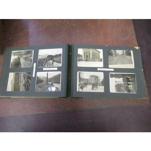 303 - Four photograph albums containing a quantity of 19th Century and later photographs of Canada, Fiji, ... 